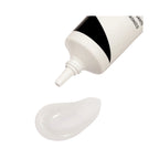 Refect Beauty Astra Zen Routine face primer in a white squeeze tube with a clear gel texture swatch on a white background