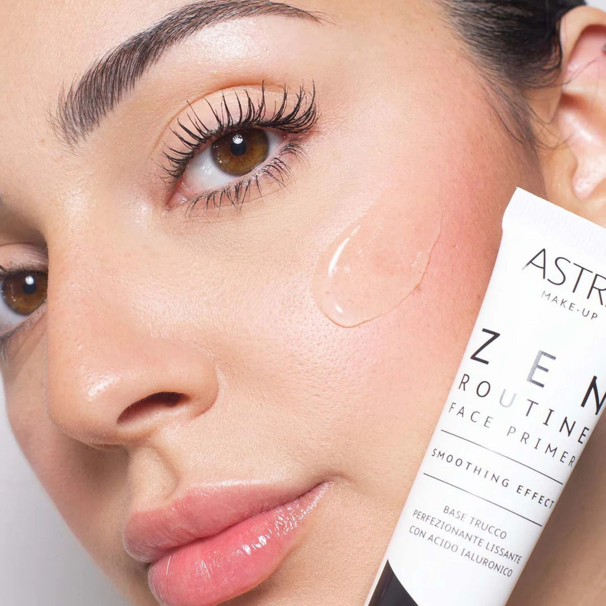 Refect Beauty Astra Zen Routine smoothing face primer with hyaluronic acid applied to a model's cheek