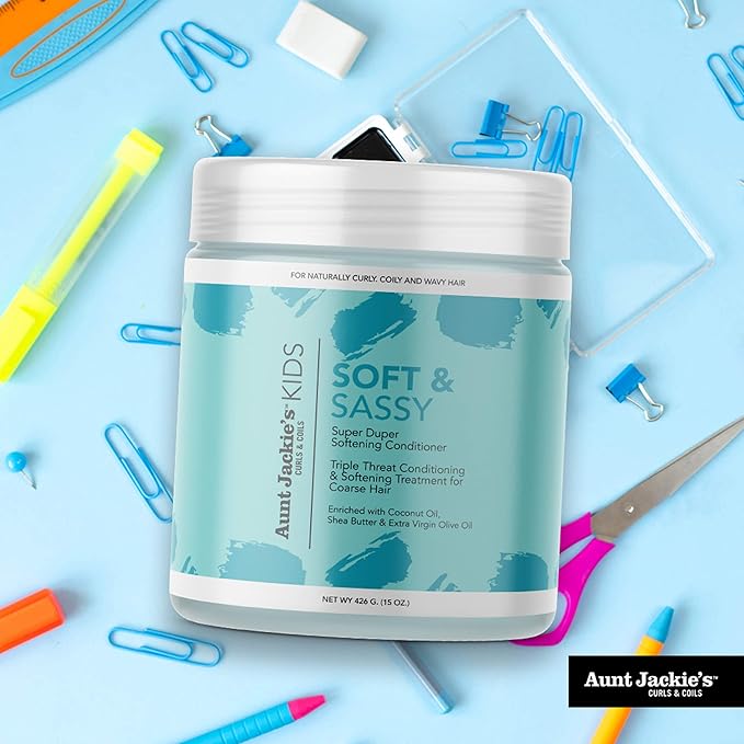Refect Beauty Aunt Jackie's Kids Soft & Sassy Super Duper Softening Conditioner jar on a blue desk with school supplies