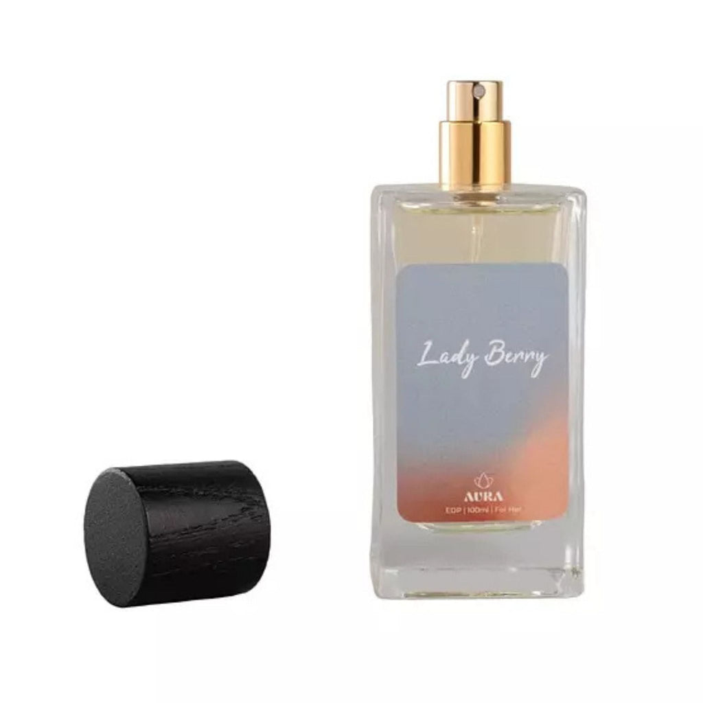 Refect Beauty Aura Lady Berry Eau de Parfum in a clear glass bottle with a gold spray nozzle and black wooden cap.