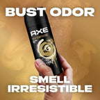 Refect Beauty AXE Gold Temptation deodorant body spray can held in hand with gold swirl design and black background