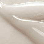 Refect Beauty AXIS-Y Dark Spot Correcting Glow Serum texture showing a smooth, lightweight, off-white gel consistency.