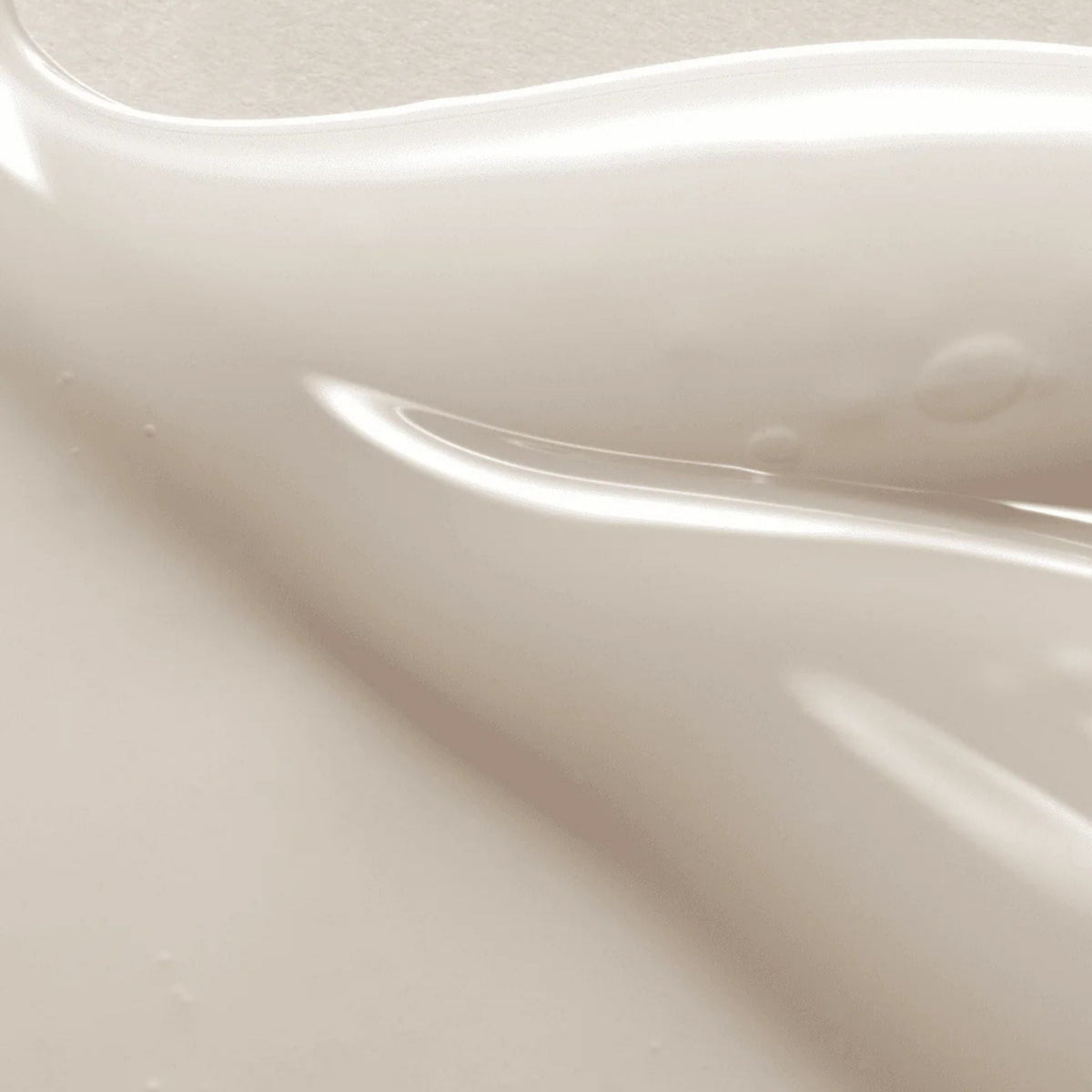 Refect Beauty AXIS-Y Dark Spot Correcting Glow Serum texture showing a smooth, lightweight, off-white gel consistency.