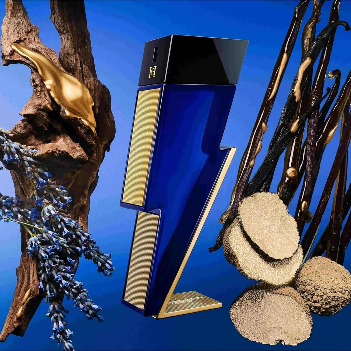 Refect Beauty Carolina Herrera Bad Boy Cobalt Absolute perfume bottle surrounded by lavender, wood, and vanilla beans.