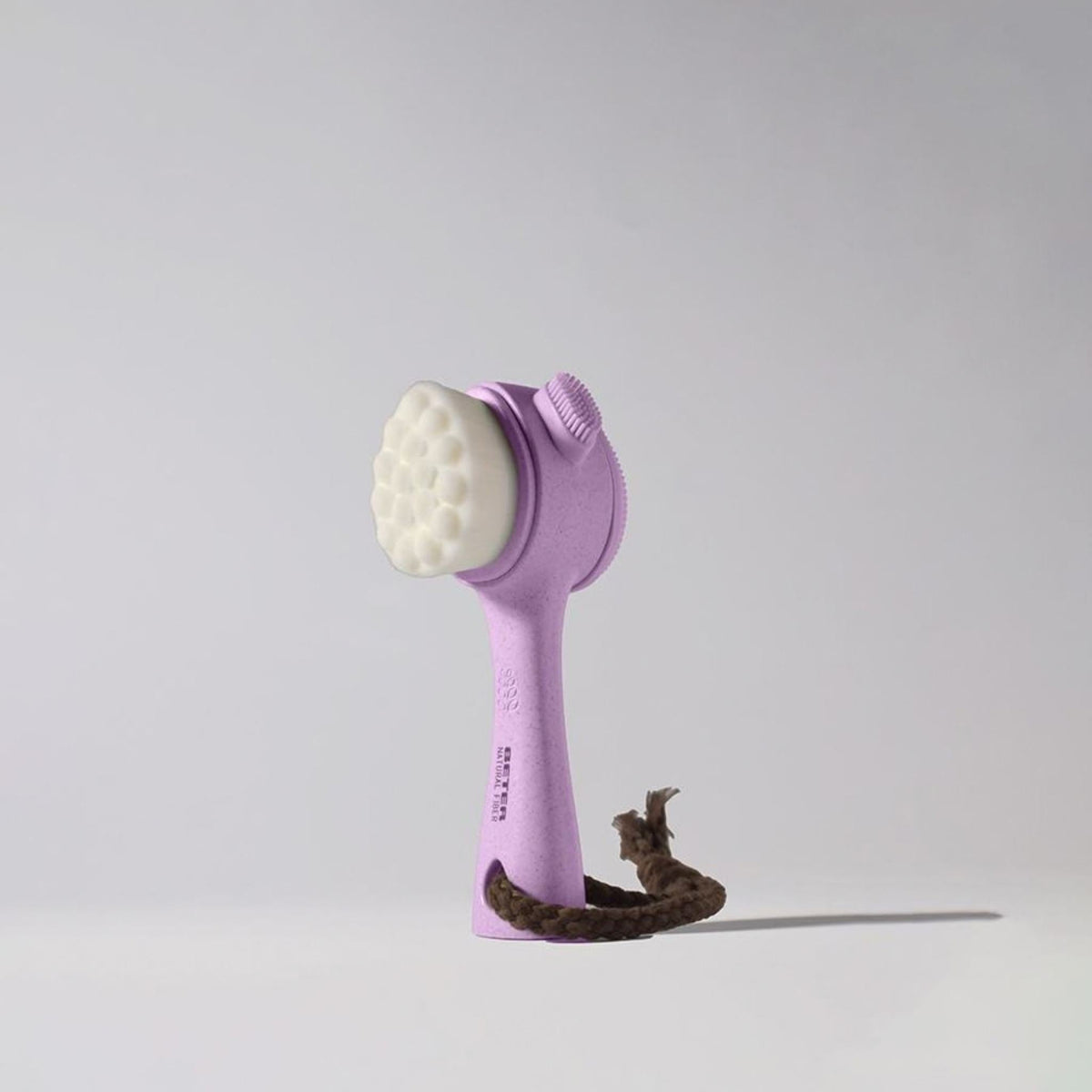 Refect Beauty Beter 2IN1 lavender facial cleansing and massage brush with soft white bristles and a hanging cord