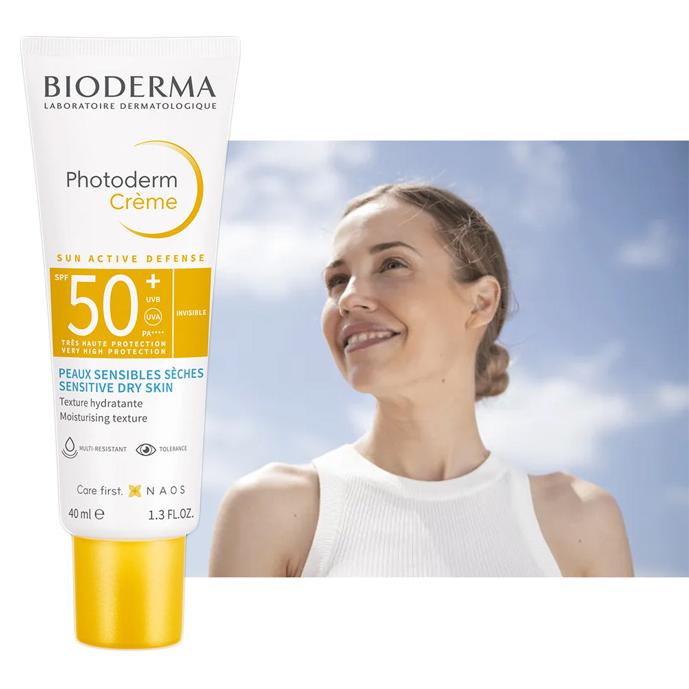 Refect Beauty Bioderma Photoderm SPF 50+ sunscreen cream for sensitive dry skin held by a smiling woman