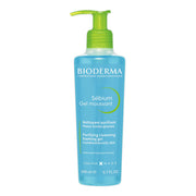 Refect Beauty Bioderma Sébium Gel Moussant foaming cleanser in a blue bottle with a green pump for oily skin.