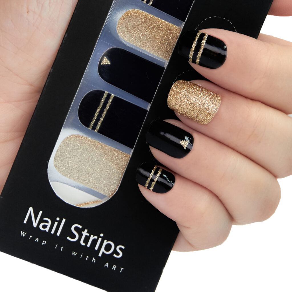 Refect Beauty Yolo Nail Strips featuring black and gold glitter designs for a salon-style manicure at home.