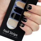 Refect Beauty Yolo Nail Strips featuring black and gold glitter designs for a salon-style manicure at home.