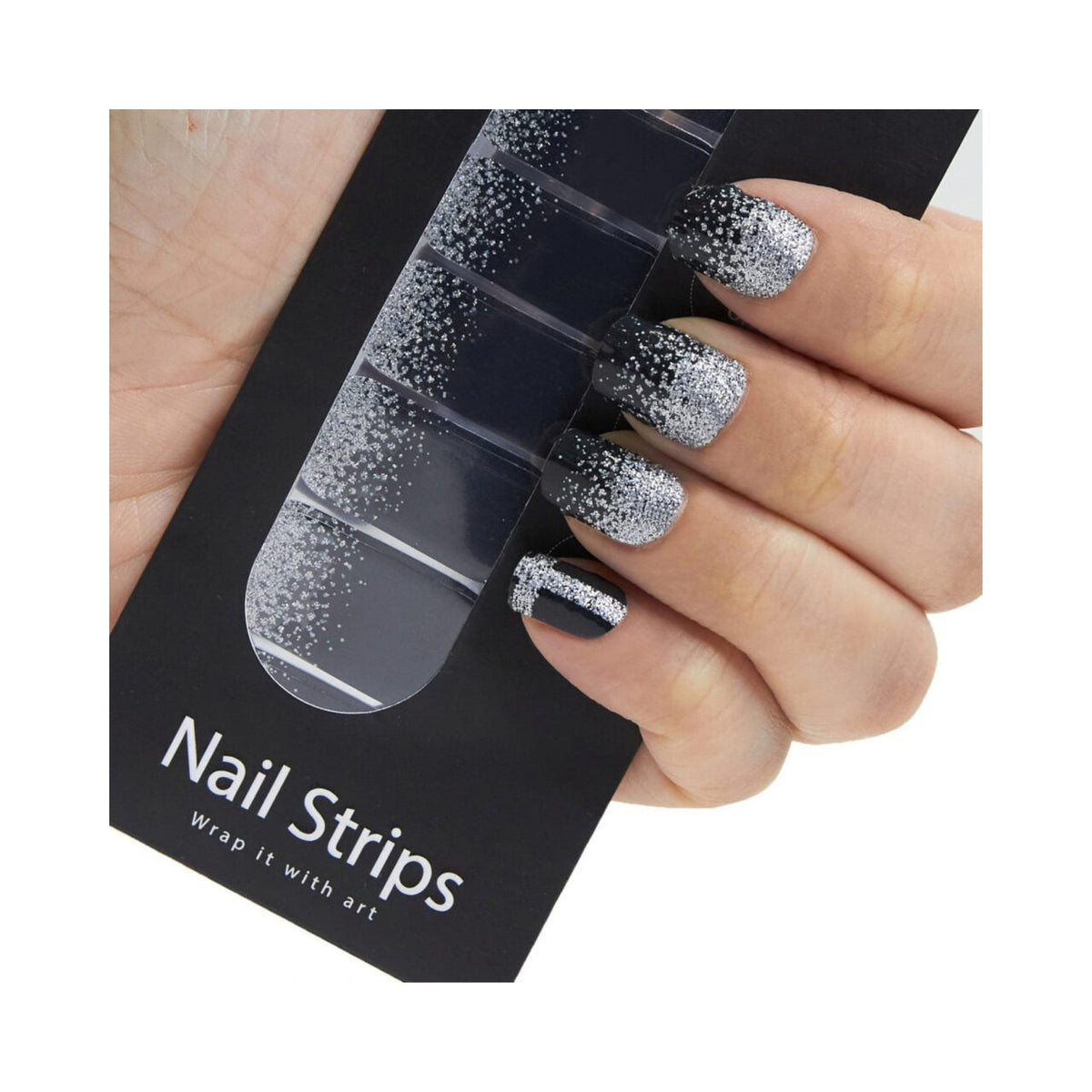 Refect Beauty Yolo Nail Strips featuring a black and silver glitter ombre design on a hand for a salon-style manicure.