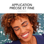 Refect Beauty model with curly hair wearing bright blue winged eyeliner applied with Bourjois Contour Clubbing pencil