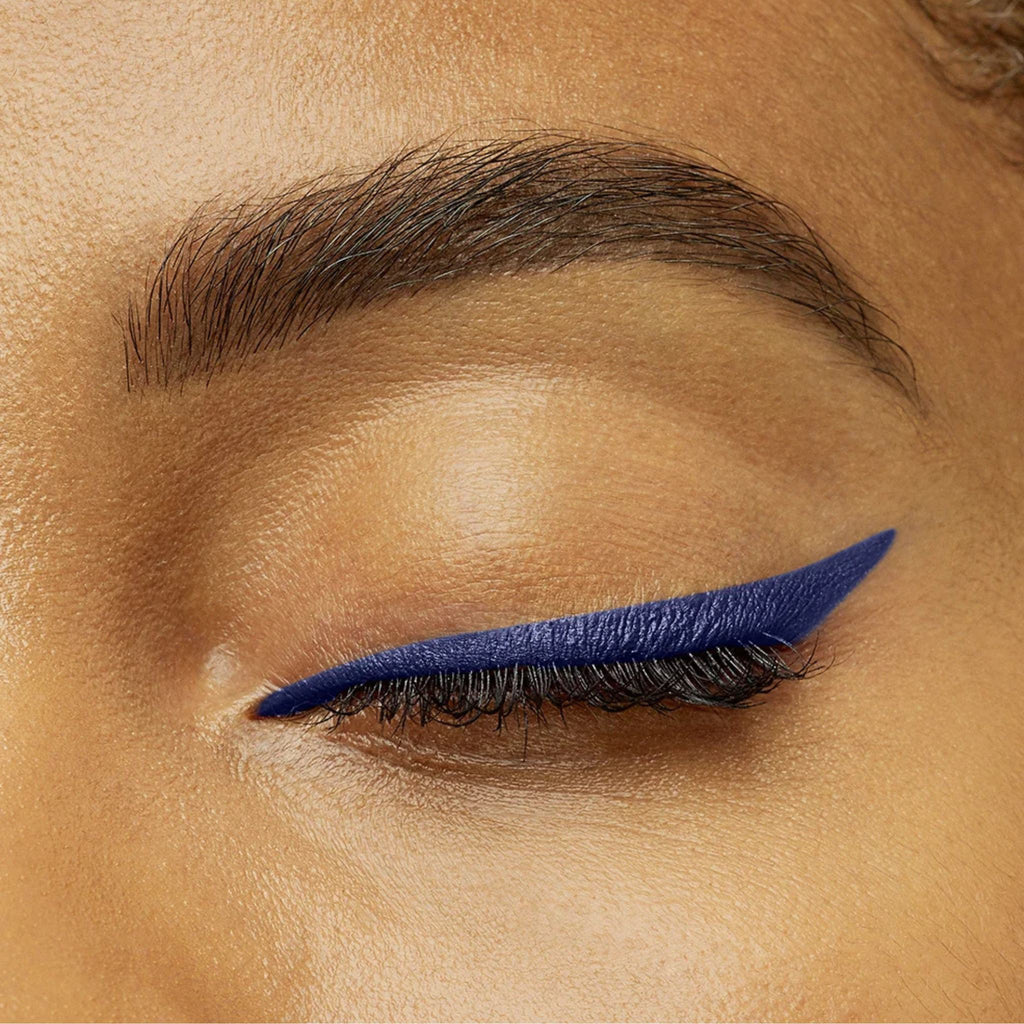 Refect Beauty Bourjois Contour Clubbing waterproof eyeliner applied in a sharp blue wing on a closed eyelid