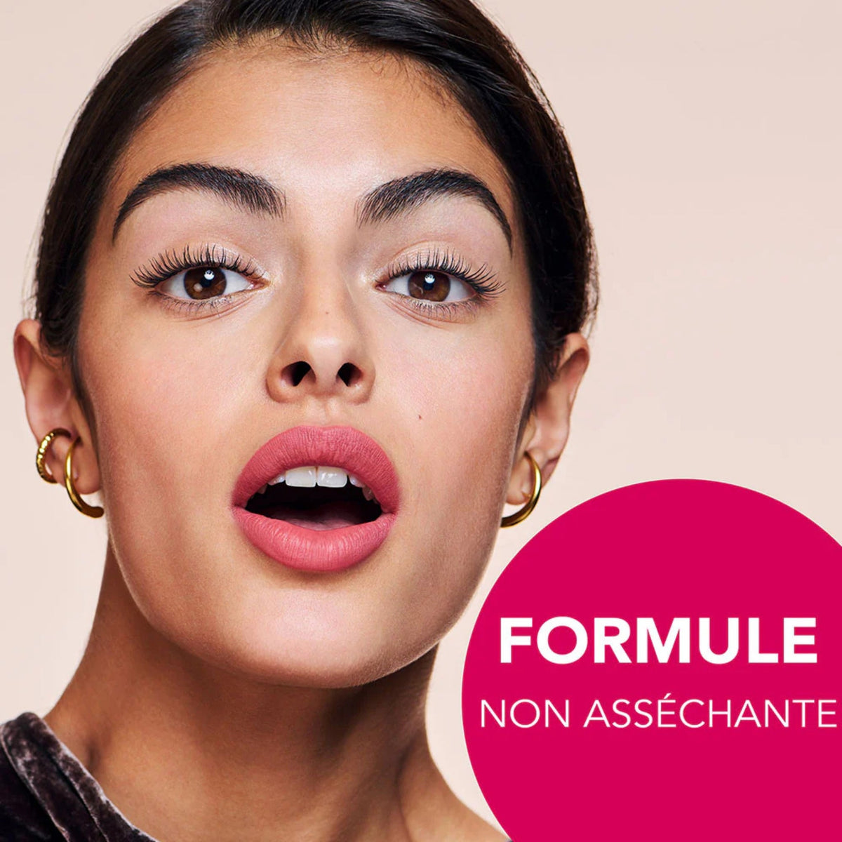 Refect Beauty model wearing Bourjois Rouge Velvet The Lipstick in a soft matte pink shade with a velvety finish
