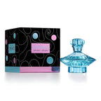 Refect Beauty Britney Spears Curious eau de parfum bottle in blue glass next to its black and pink patterned box