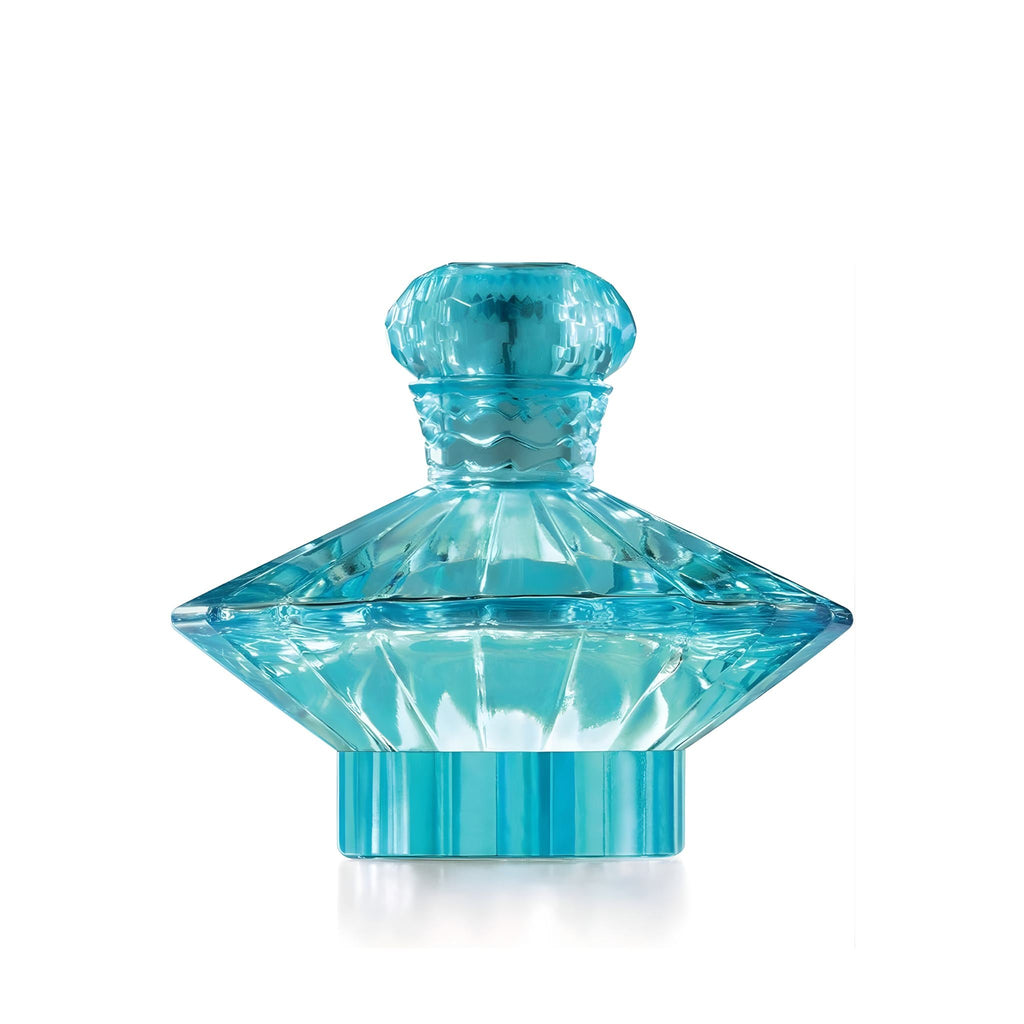 Refect Beauty Britney Spears Curious eau de parfum in a distinctive faceted blue glass bottle with a matching cap.