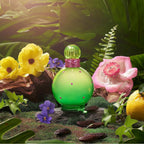 Refect Beauty Britney Spears Jungle Fantasy perfume bottle in a lush tropical jungle setting with flowers and leaves.