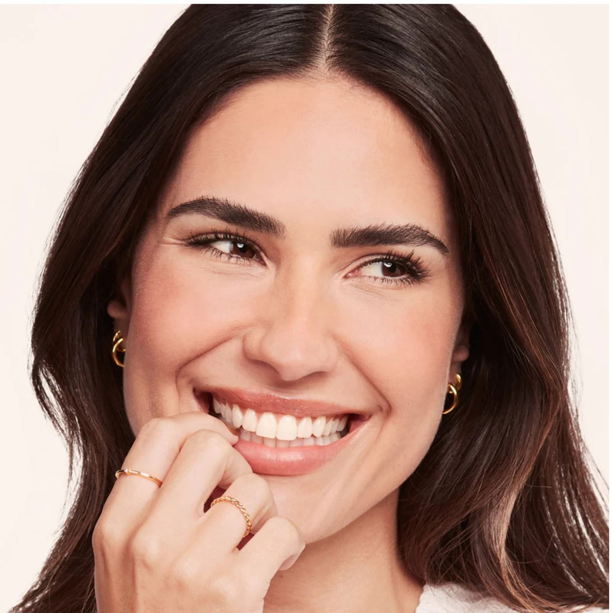 Refect Beauty model with perfectly shaped, lifted brows using Bourjois Brow Reveal Wax for a natural laminated look.