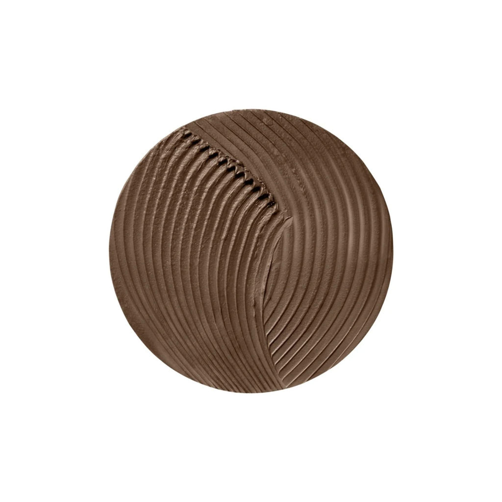 Refect Beauty Bourjois Brow Reveal wax texture swatch showing a smooth brown cream with a laminated effect finish