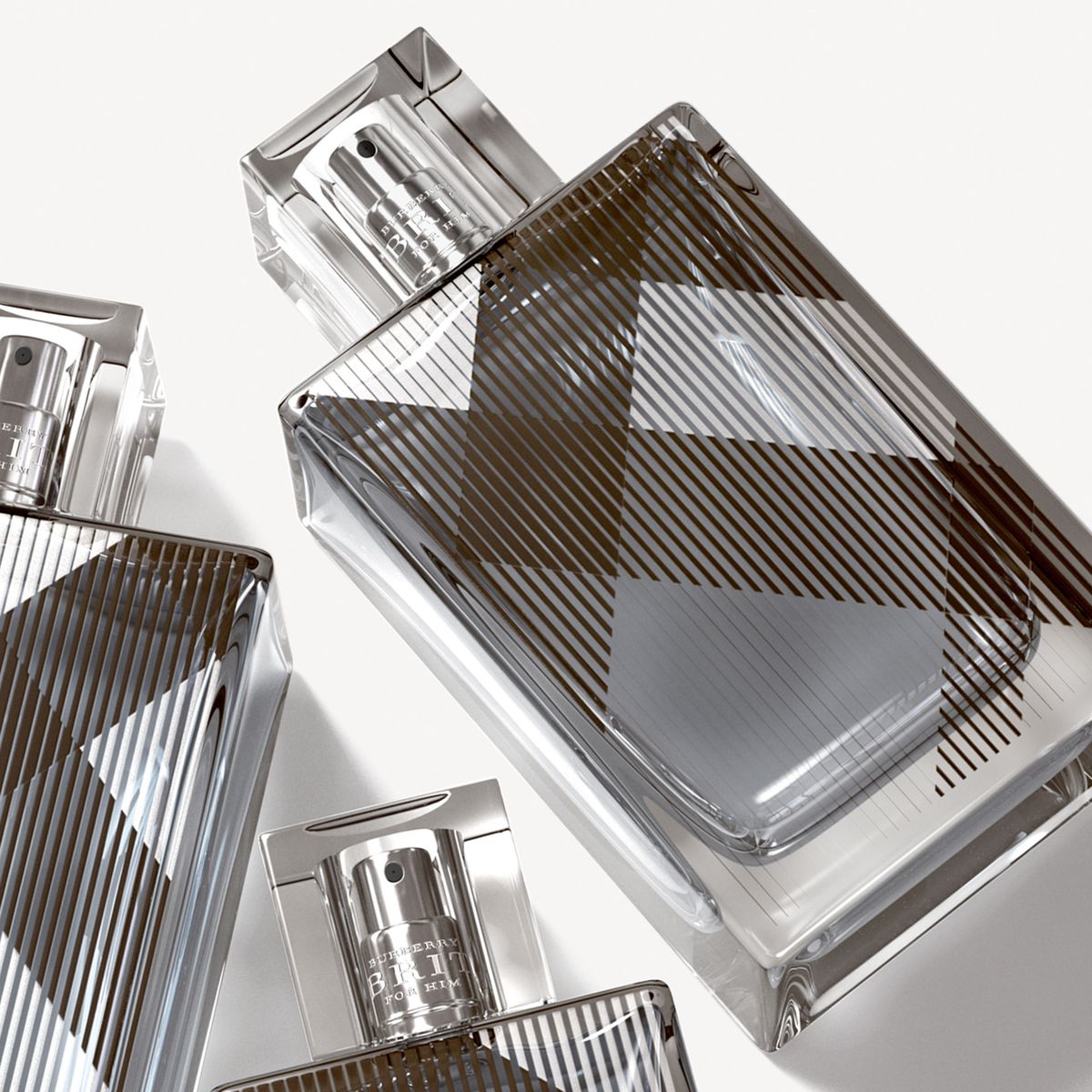 Refect Beauty Burberry Brit For Him Eau de Toilette glass fragrance bottles featuring the iconic check pattern