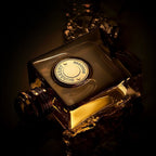 Refect Beauty Burberry Goddess Parfum bottle with golden liquid, elegant glass design, and dark moody lighting.
