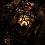 Refect Beauty Burberry Goddess Parfum bottle submerged in dark, swirling liquid with golden light reflections