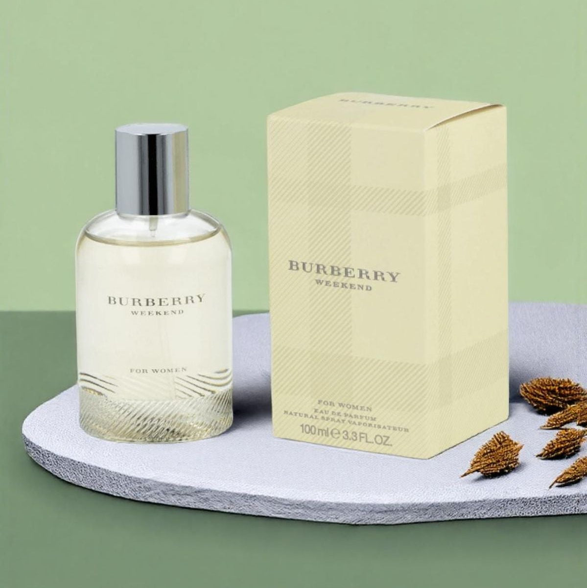 Refect Beauty Burberry Weekend for Women Eau de Parfum bottle and signature beige check box on a grey surface