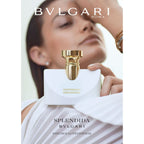 Refect Beauty Bvlgari Splendida Patchouli Tentation perfume bottle held by a woman in a white dress