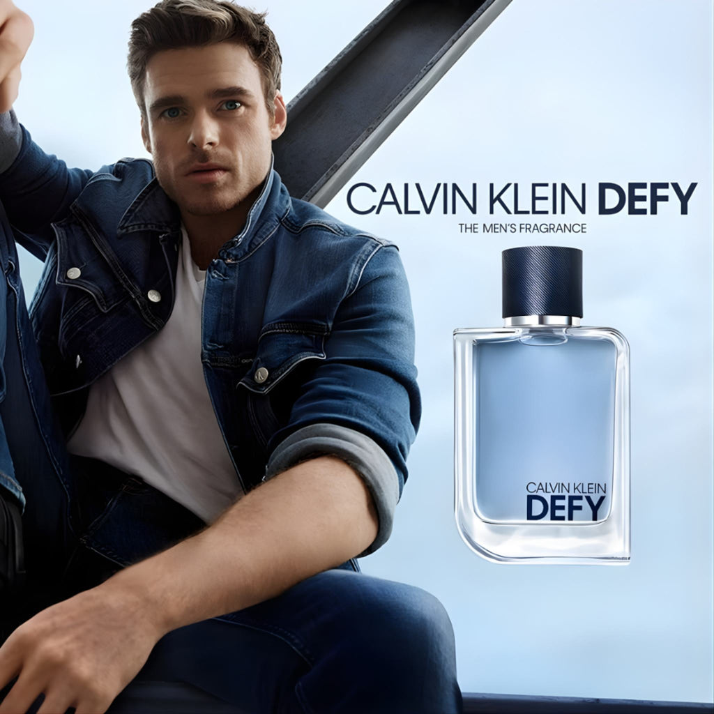 Refect Beauty Calvin Klein Defy Eau de Toilette bottle next to a man wearing a denim jacket