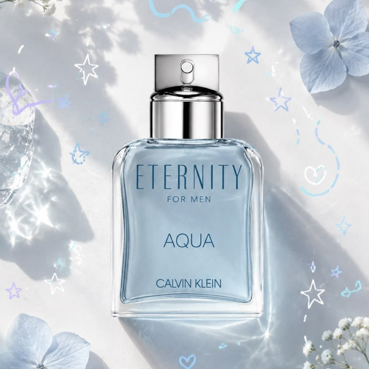 Refect Beauty Calvin Klein Eternity Aqua for Men eau de toilette bottle with light blue liquid on a floral background