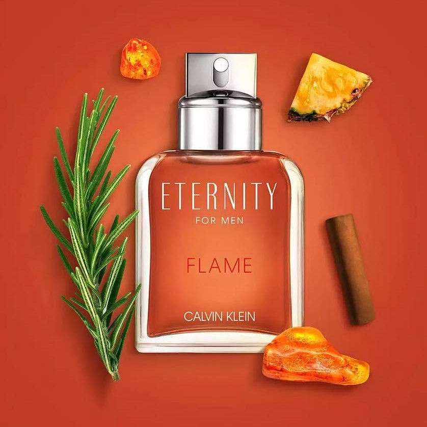 Refect Beauty Calvin Klein Eternity Flame for Men EDT bottle surrounded by rosemary, amber, and spice ingredients.