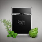 Refect Beauty Calvin Klein Man Eau de Toilette 100ml bottle with bergamot and fresh green leaves on grey background