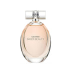Refect Beauty Calvin Klein Sheer Beauty Eau de Toilette in a clear oval glass bottle with a soft peach fragrance.