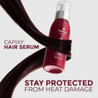 Refect Beauty Capixy hair treatment serum bottle wrapped in a strand of dark hair against a light background