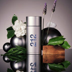 Refect Beauty Carolina Herrera 212 Men NYC fragrance bottle surrounded by gardenia, lavender, and woody elements.