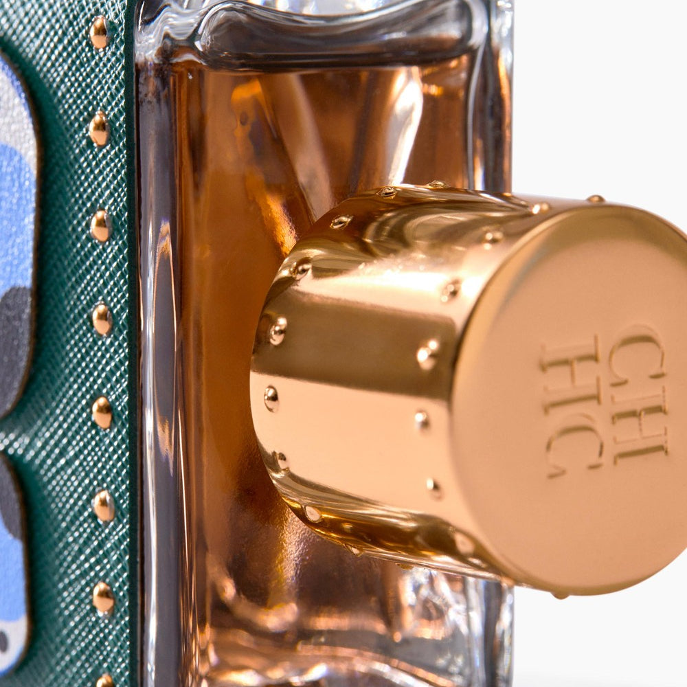 Refect Beauty Carolina Herrera Birds Of Paradise perfume bottle with a gold cap and green textured leather detail