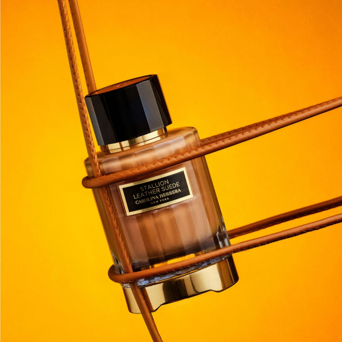 Refect Beauty Carolina Herrera Stallion Leather unisex eau de parfum bottle wrapped in brown leather straps