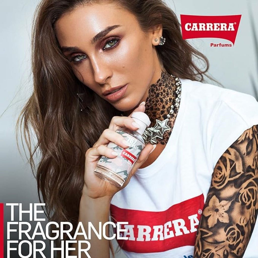 Refect Beauty Carrera Jeans 767 Camouflage Donna perfume held by a stylish woman with tattoos and a white graphic tee