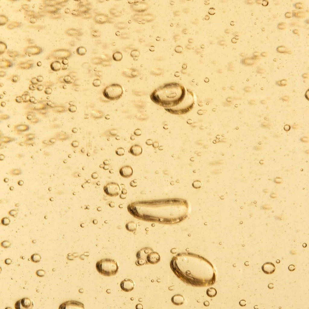 Refect Beauty SKIN1004 Centella Toning Toner with a light brown watery texture and visible air bubbles