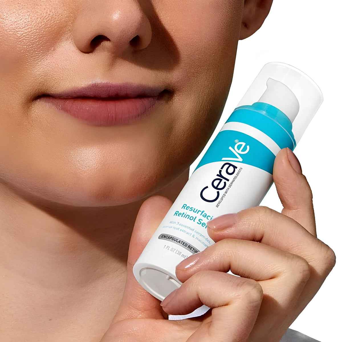 Refect Beauty CeraVe Resurfacing Retinol Serum bottle held by a woman to show skin texture improvement