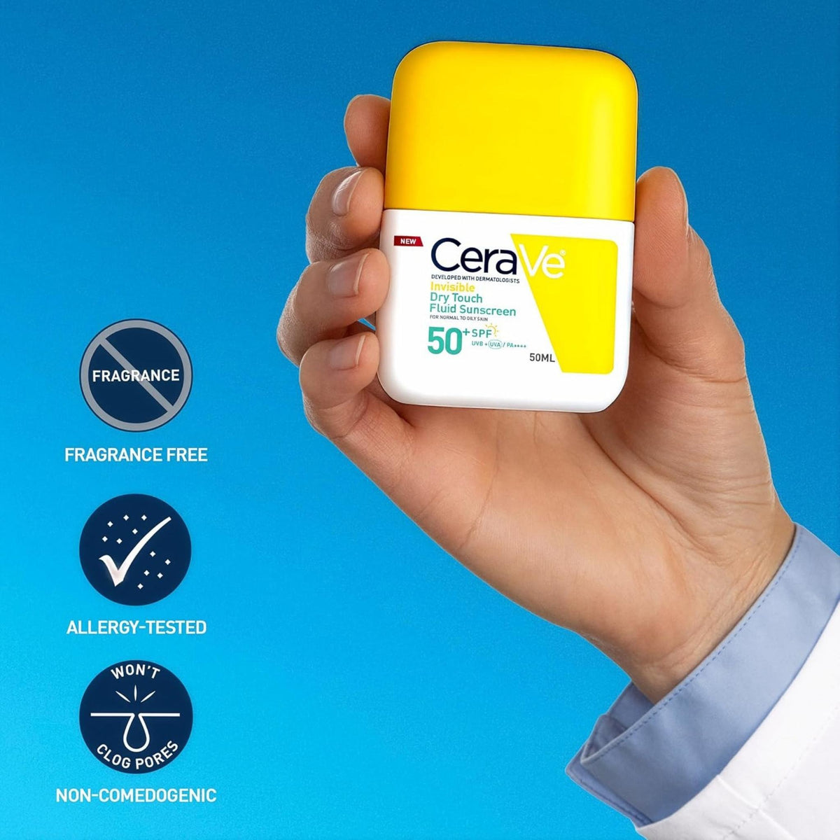 Refect Beauty CeraVe Invisible Dry Touch Fluid Sunscreen SPF 50+ bottle held in hand against a blue background.