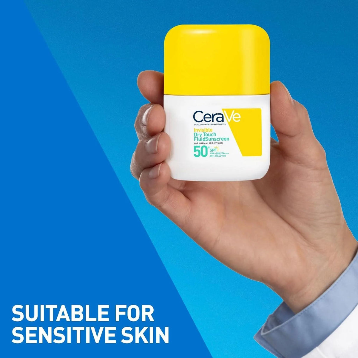 Refect Beauty CeraVe Invisible Dry Touch Fluid Sunscreen SPF 50+ held in a hand against a blue background
