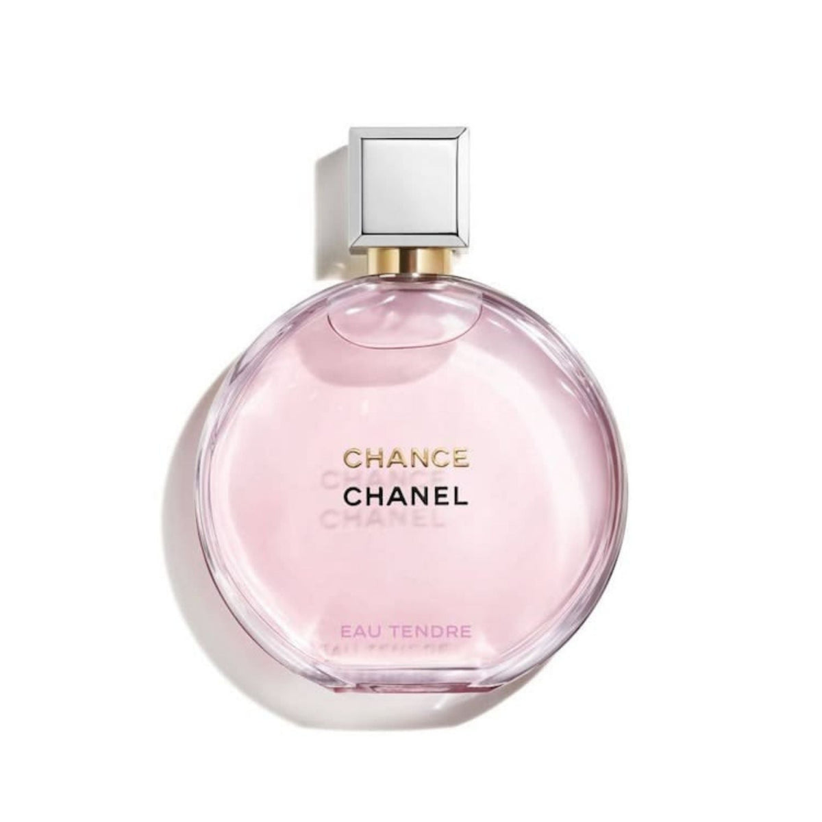 Refect Beauty Chanel Chance Eau Tendre perfume in a round glass bottle with soft pink liquid and a silver cap.