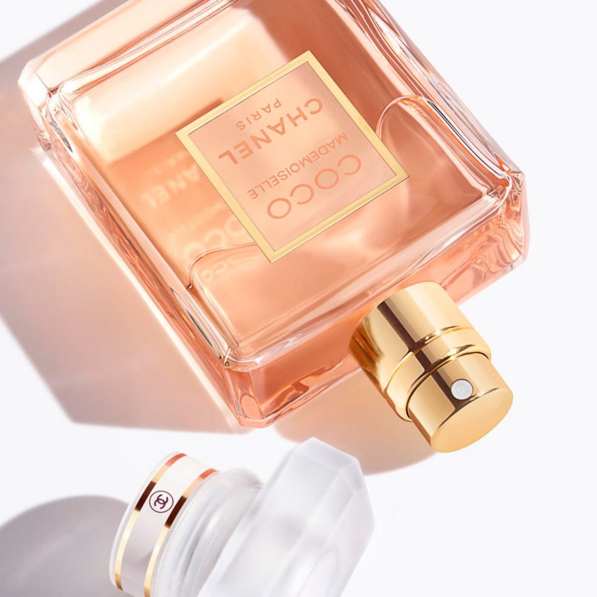 Refect Beauty Chanel Coco Mademoiselle Eau de Parfum in a glass bottle with a gold spray nozzle and white cap
