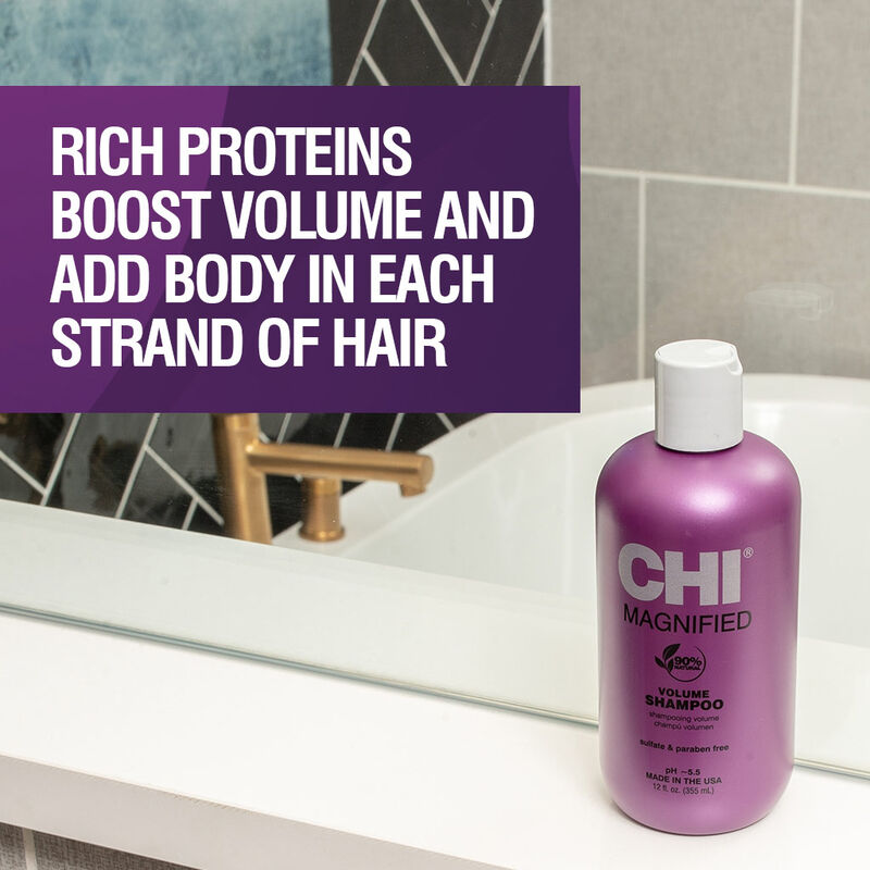 Refect Beauty CHI Magnified Volume Shampoo bottle in purple packaging for fine hair, displayed on a bathroom counter.