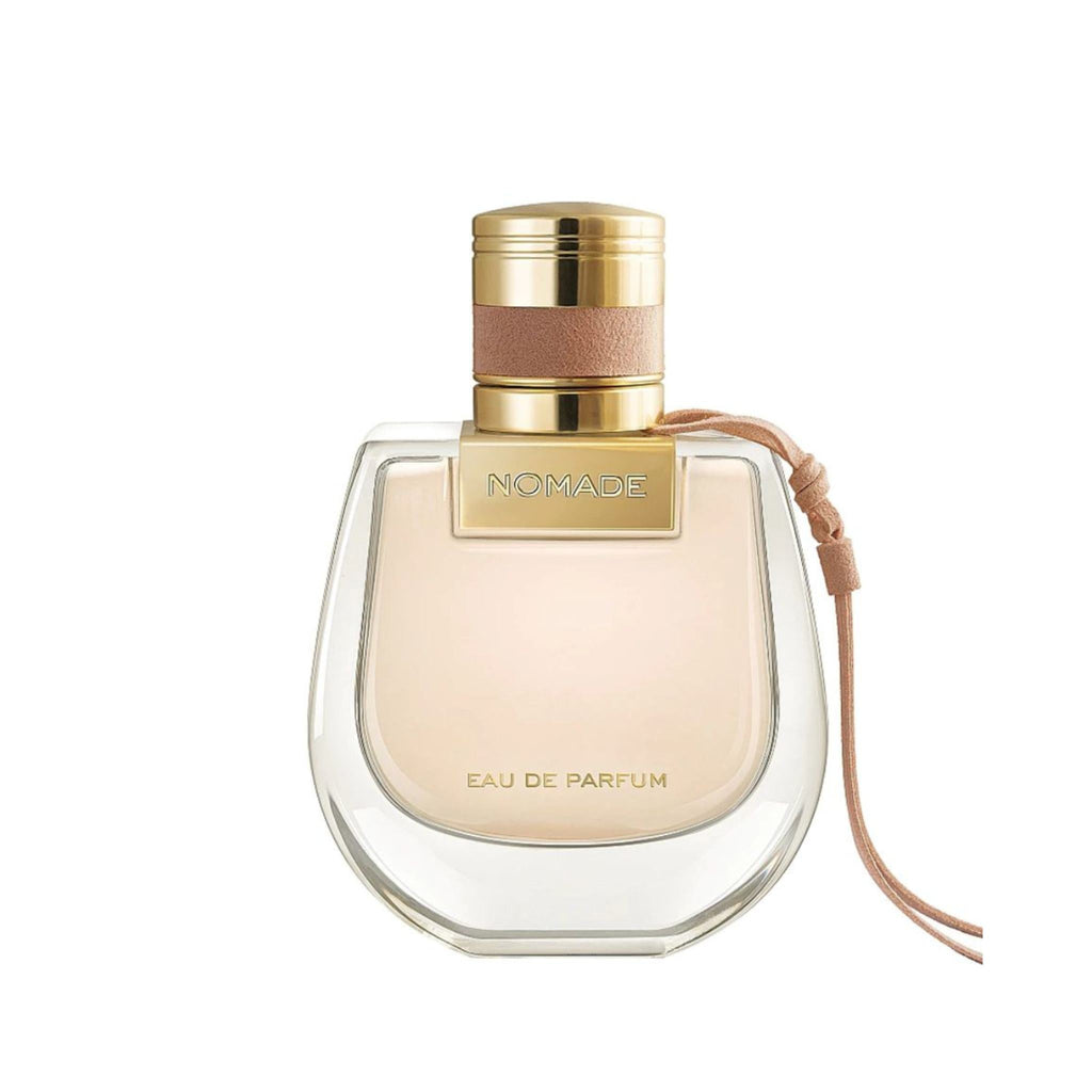 Refect Beauty Chloé Nomade Eau de Parfum in a rounded glass bottle with a gold cap and suede ribbon detail.