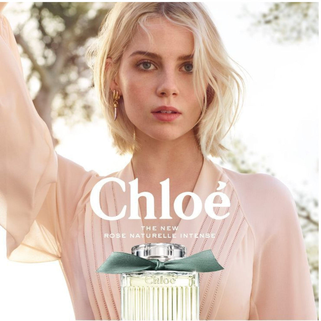Refect Beauty Chloe Rose Naturelle Intense perfume bottle with a green ribbon, featured in a campaign with a blonde model