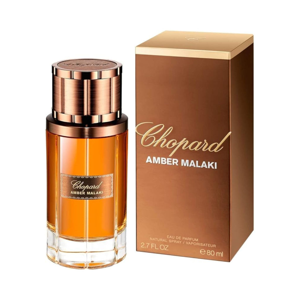 Refect Beauty Chopard Amber Malaki Eau de Parfum bottle and box featuring a warm amber liquid and metallic gold cap.