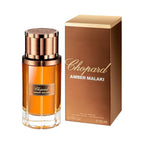 Refect Beauty Chopard Amber Malaki Eau de Parfum bottle and box featuring a warm amber liquid and metallic gold cap.