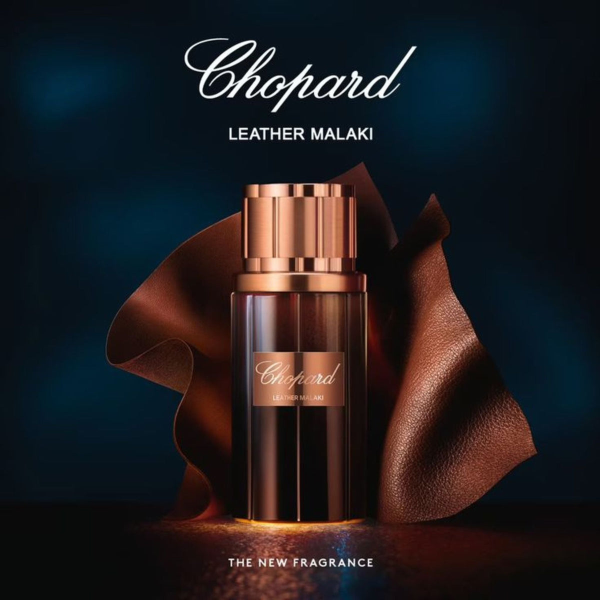 Refect Beauty Chopard Leather Malaki perfume bottle with metallic cap against a dark background and leather fabric