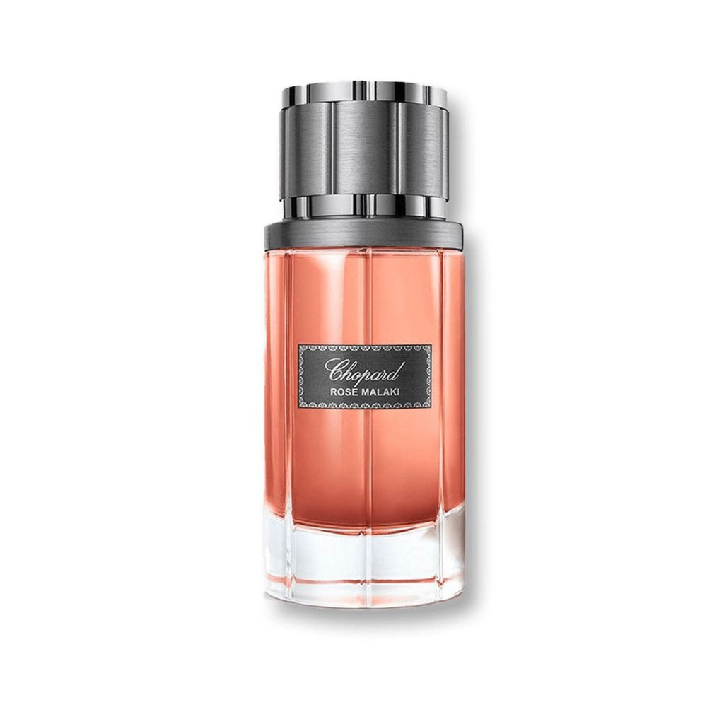 Refect Beauty Chopard Rose Malaki Eau de Parfum in a clear glass bottle with a metallic cap and rose-tinted liquid.